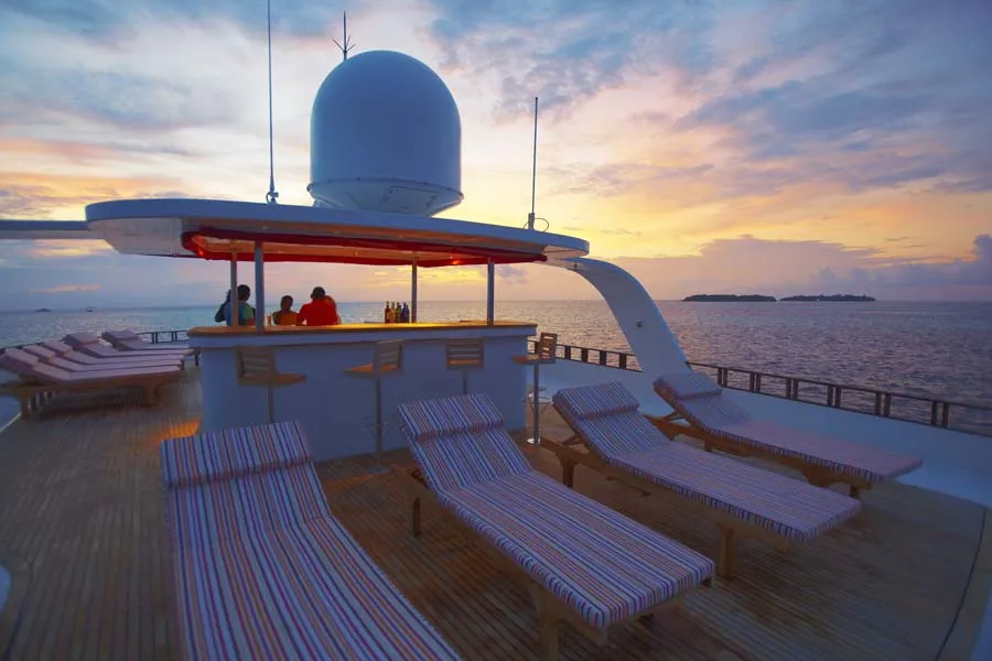 Sunset on the Sundeck: A Tranquil Evening Aboard Theia Liveaboard, Embracing the Beauty of Nature's Finest Hour