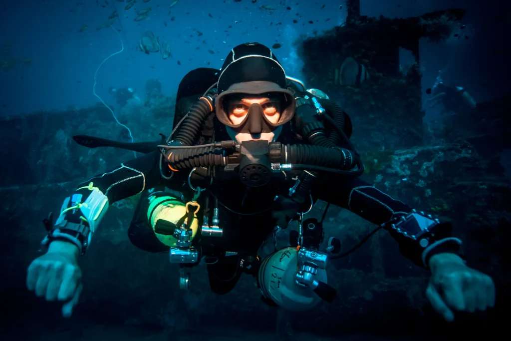 scuba diver using rebreather equipments