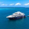 Showing a luxury yacht sailing on the sea