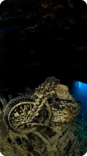 Sunken Motorcycle in the Depth of the Ocean Wreck